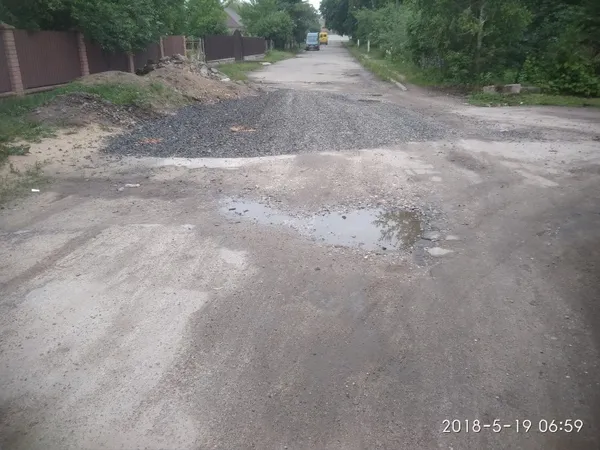 Лучани просять відремонтувати дорогу на Вересневому (фото)