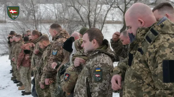 Молитва і занурення: бійці Волинської бригади відзначили Водохреще (фото)