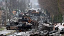 В парламенті Молдови під звуки сирен показали фотографії з Бучі (відео)