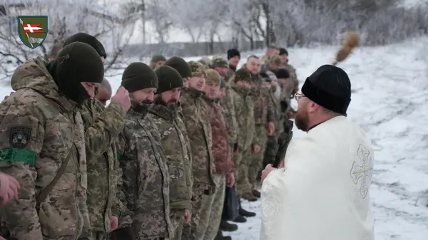 Молитва і занурення: бійці Волинської бригади відзначили Водохреще (фото)