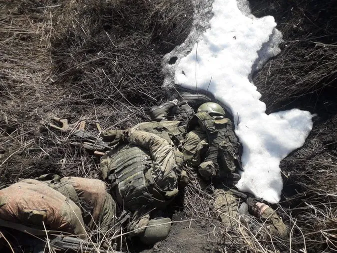 На Харківщині виявили трупи російських солдатів без слідів насильницької смерті (фото 18+)
