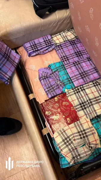 Відмивали мільйони доларів: ДБР розкрило схему виведення коштів російських бізнесменів з країни (фото, відео)