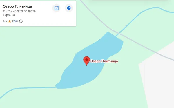 В озері на Поліссі рибалка впіймав гігантського коропа (фото)