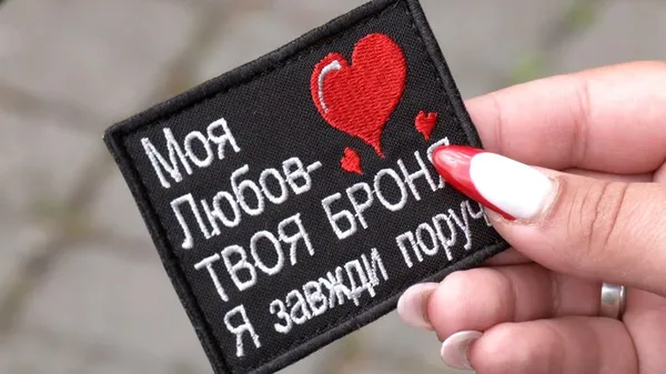 Фотосесія у формі чоловіка: вдова кулеметника з Волині Івана Зелінського поділилася спогадами про коханого (фото)