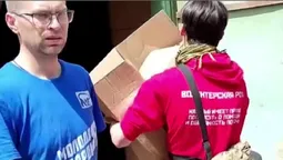 Російські окупанти завезли 5 тисяч своїх підручників до школи в Маріуполі