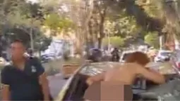 Голий чоловік гепнувся з дерева на таксі (фото)