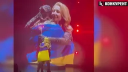 До сліз: військова з 100-Ї бригади ТрО заспівала разом з Тіною Кароль у Луцьку (відео)
