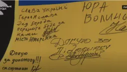 Луцькі волонтери зібрали пів сотні прапорів із подяками від бійців (відео)