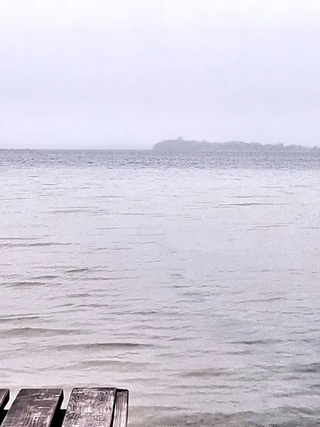 Вода злилася з небом: показали туманні фото Світязю