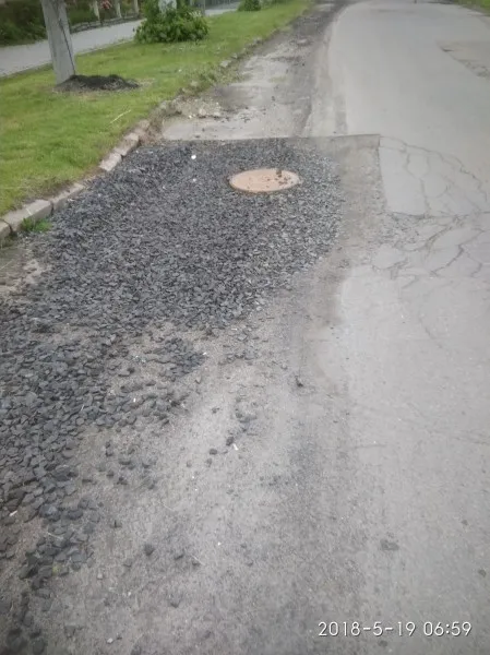 Лучани просять відремонтувати дорогу на Вересневому (фото)