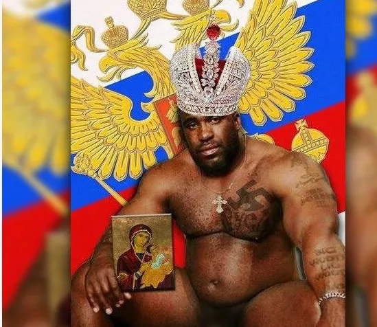 У Росії – скандал через темношкірого з георгіївською стрічкою на пенісі (фото18+)