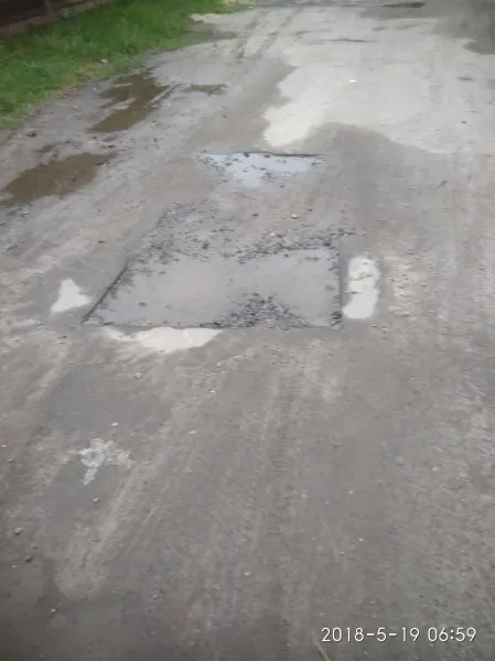 Лучани просять відремонтувати дорогу на Вересневому (фото)