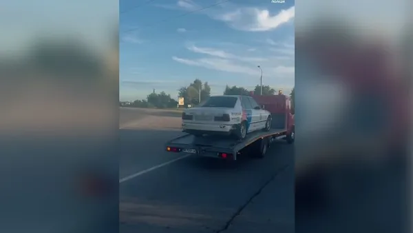 Автомобіль, який повезли на арештмайданчик.