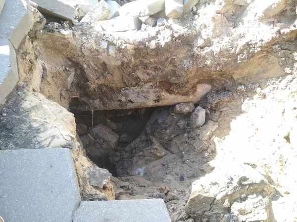 На вулиці Лесі Українки обвалилася земля (фото)