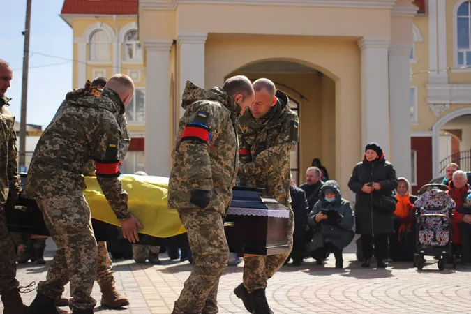 Зі сльозами та на колінах: Луцьк попрощався з трьома своїми Героями (фото, відео)