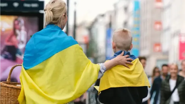 Де працює найбільше біженців з України