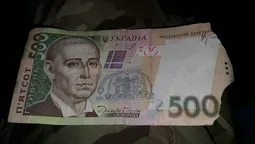 У луцький супермаркет викликали поліцію через надірвану купюру (фото)