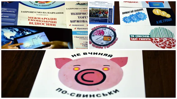 Один зі столів у Надії Хвищун  встелено рекламними брошурами та мотиваційними наклейками