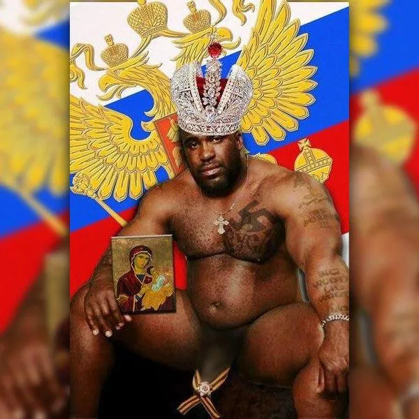 У Росії – скандал через темношкірого з георгіївською стрічкою на пенісі (фото18+)