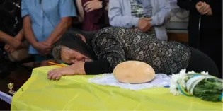 У рідному селі на Волині попрощалися з загиблим на Донеччині воїном Русланом Снопком